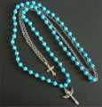NECKLACE DOUBLE CRUCIFIX LIGHT BLUE BEAD AND CHAIN
