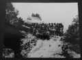 SOLDIERS AND NATIVES TRANSPORTING CAR ON POLES (INDIA?) GLOSS B/W RP #1